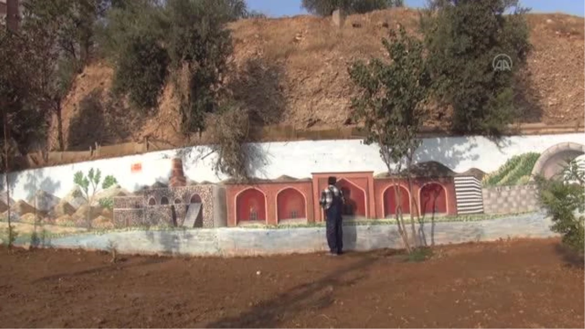 Belediyenin 11 yıllık temizlik işçisi Cizre\'nin duvarlarını resimlerle süsledi