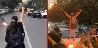 İran'da protestolar sürüyor! Öfkeli kadınlar irşat polisinin aracına tekmeledi