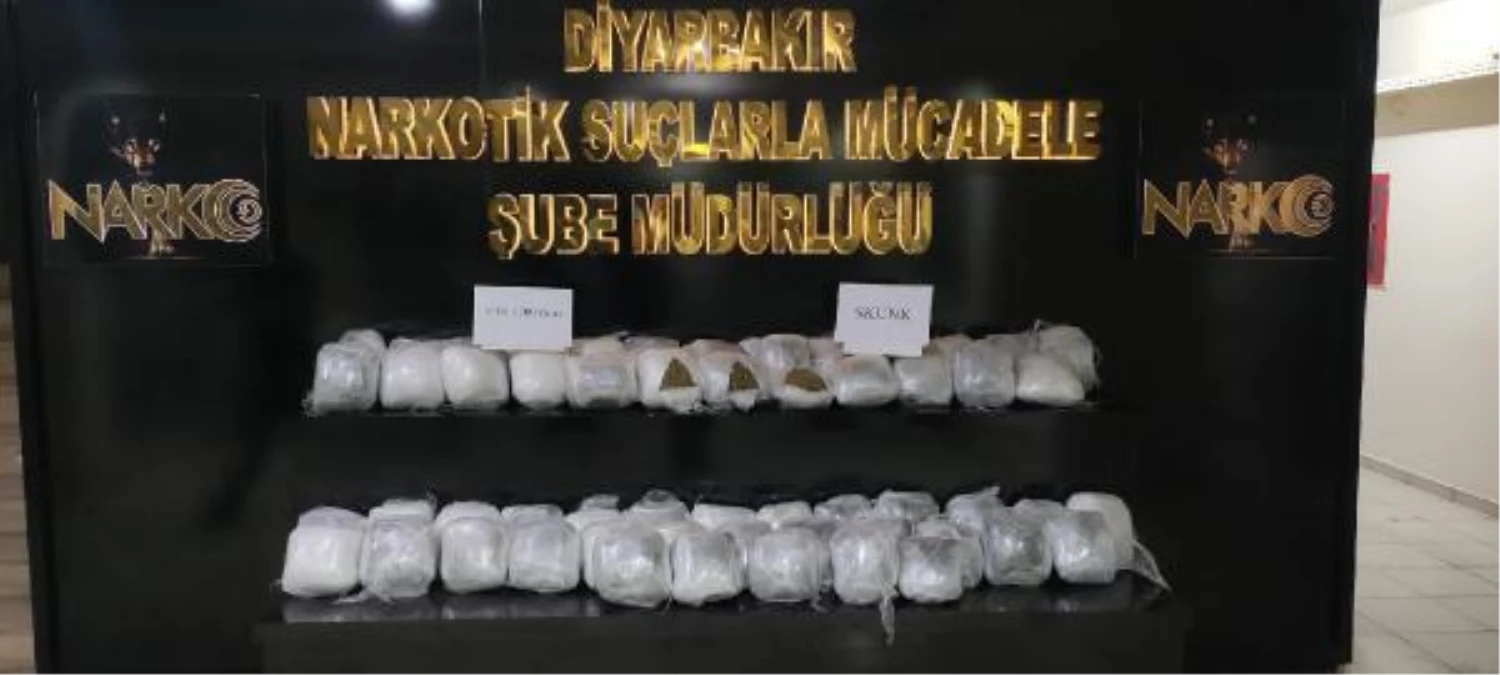 Diyarbakır gündem haberi... Diyarbakır\'da araçtaki 52 kilo uyuşturucuya 2 gözaltı