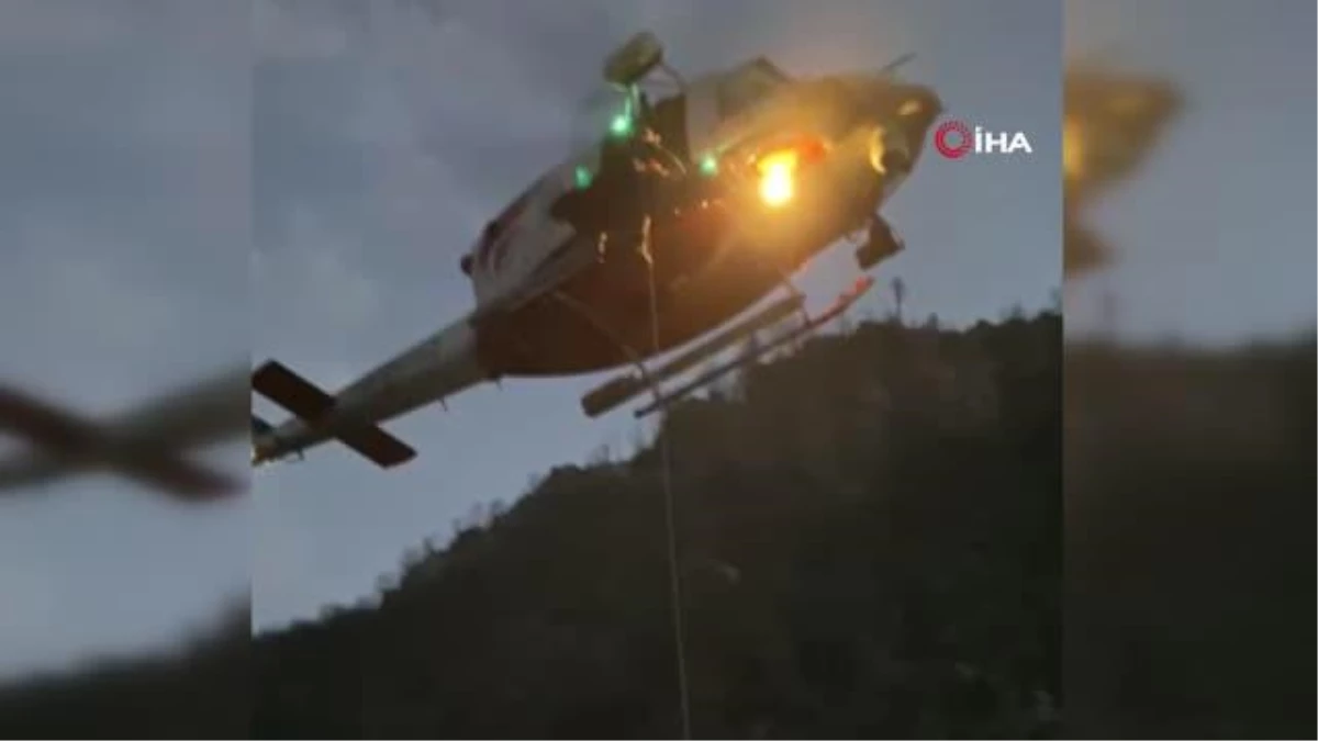 Yamaçta ayağı kırılan şahsa helikopter ile nefes kesen kurtarma