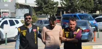 Balıkesir'de bir kişiyi telefonla dolandıran 2 şüpheli tutuklandı