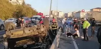 D-100'de bir otomobil takla attı... İtfaiye eri montunu çıkarıp, yaralının başının altına koydu