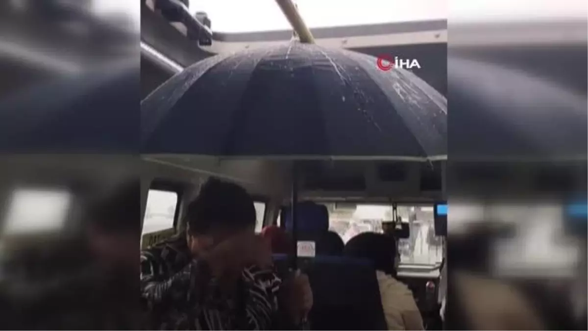 Dolmuşta şemsiyeli yolculuk kamerada