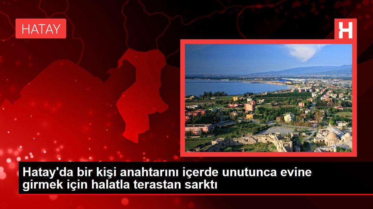 Hatay'da bir kişi anahtarını içerde unutunca evine girmek için halatla terastan sarktı