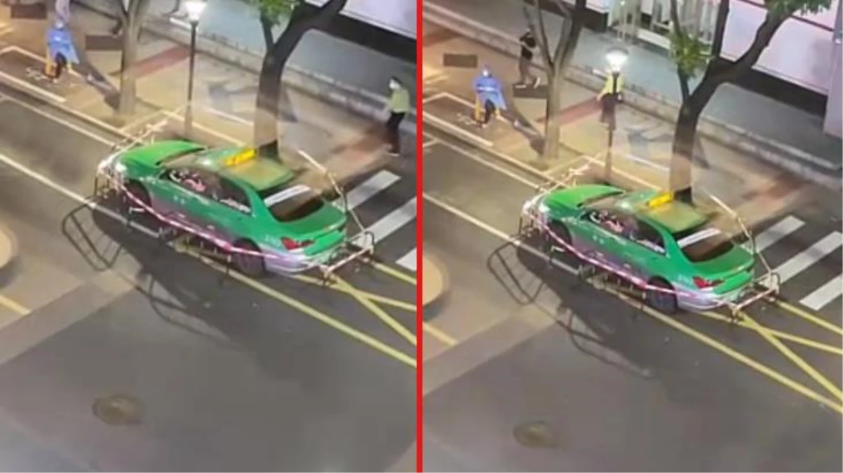 Çin\'de koronavirüs testi pozitif çıkan taksi sürücüsü, yolun ortasında aracıyla birlikte karantinaya alındı