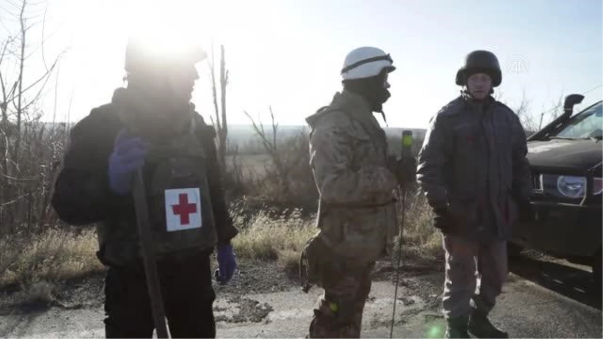 İzyum\'da arazi taramaları sırasında Rus askerlerine ait cesetler bulundu