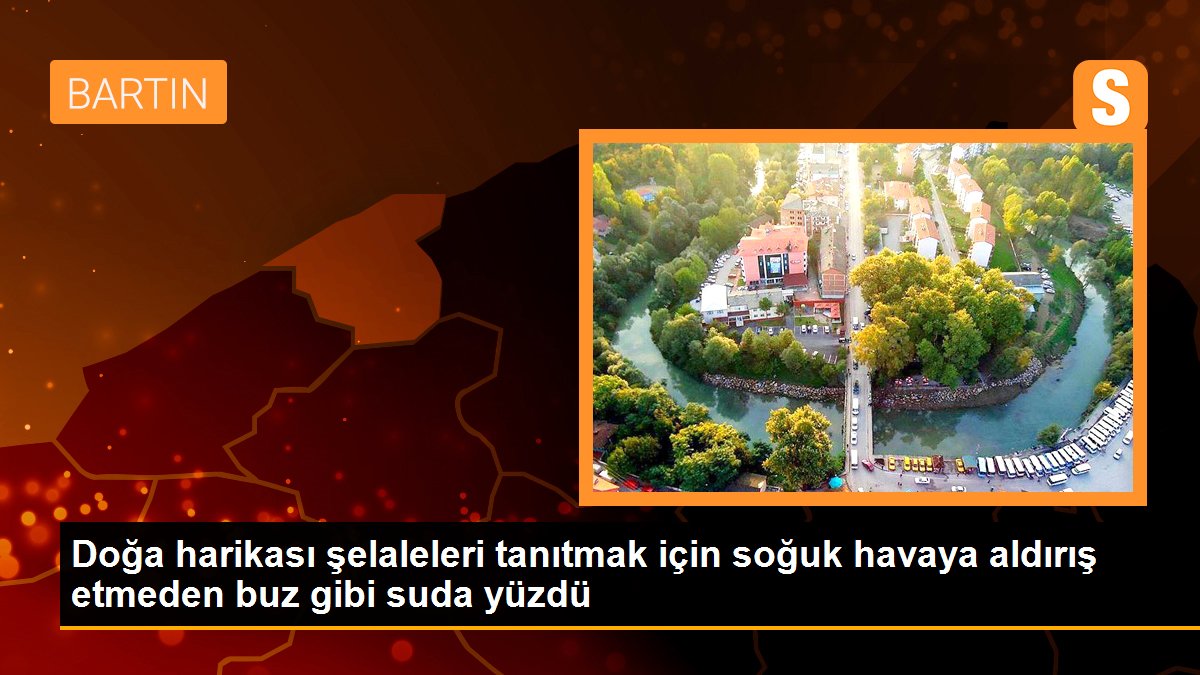 Doğa harikası şelaleleri tanıtmak için soğuk havaya aldırış etmeden buz gibi suda yüzdü