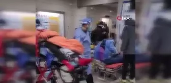 Çin'de hastanelerde yer kalmadı, hastalar koridorda tedavi ediliyor