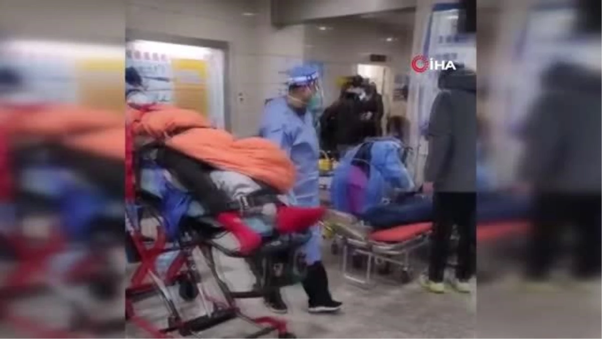 Çin\'de hastanelerde yer kalmadı, hastalar koridorda tedavi ediliyor