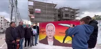 Ömrünün 40 yılını İsrail hapishanelerinde geçiren Filistinli Yunus'un portresi duvara resmedildi