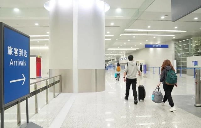 Çin'in Kovid-19 Stratejisini Optimize Etmesinden Sonra Shanghai Pudong Uluslararası Havalimanı'na Bir Bakış