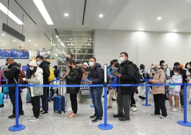 Çin'in Kovid-19 Stratejisini Optimize Etmesinden Sonra Shanghai Pudong Uluslararası Havalimanı'na Bir Bakış