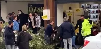 Kaldırımda yürüyen kadının başına ağaç dalı düştü
