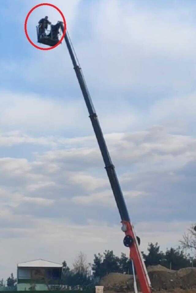 Vinç sepetinde içki içip, rastgele ateş açtı; o anlar kamerada Vinç sepetinde içki içip, rastgele ateş açtı; o anlar kamerada