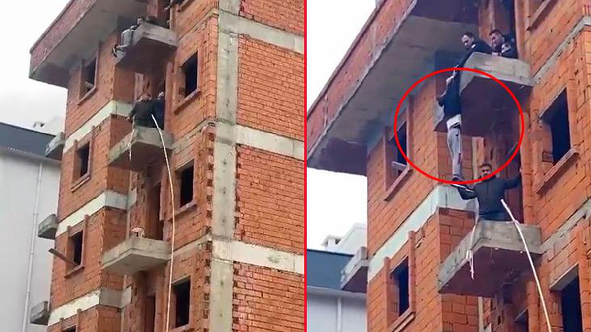 İntihar etmek için çıktığı binada dakikalarca asılı kaldı! Kameralar anbean kaydetti