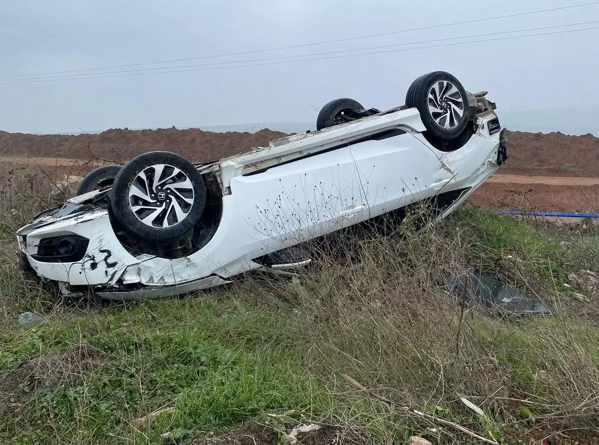 Takla atan araçtan yara almadan çıktı