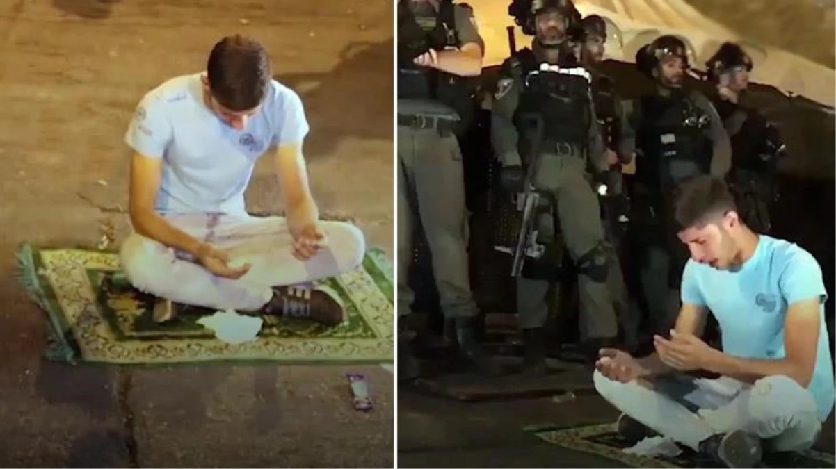 Filistinli müslüman genç, İsrail polisinin arasında seccade üzerinde yalvardı: Allah\'ım yardım et