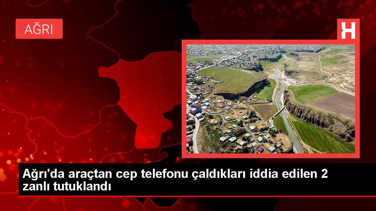 Ağrı'da araçtan cep telefonu çaldıkları iddia edilen 2 zanlı tutuklandı