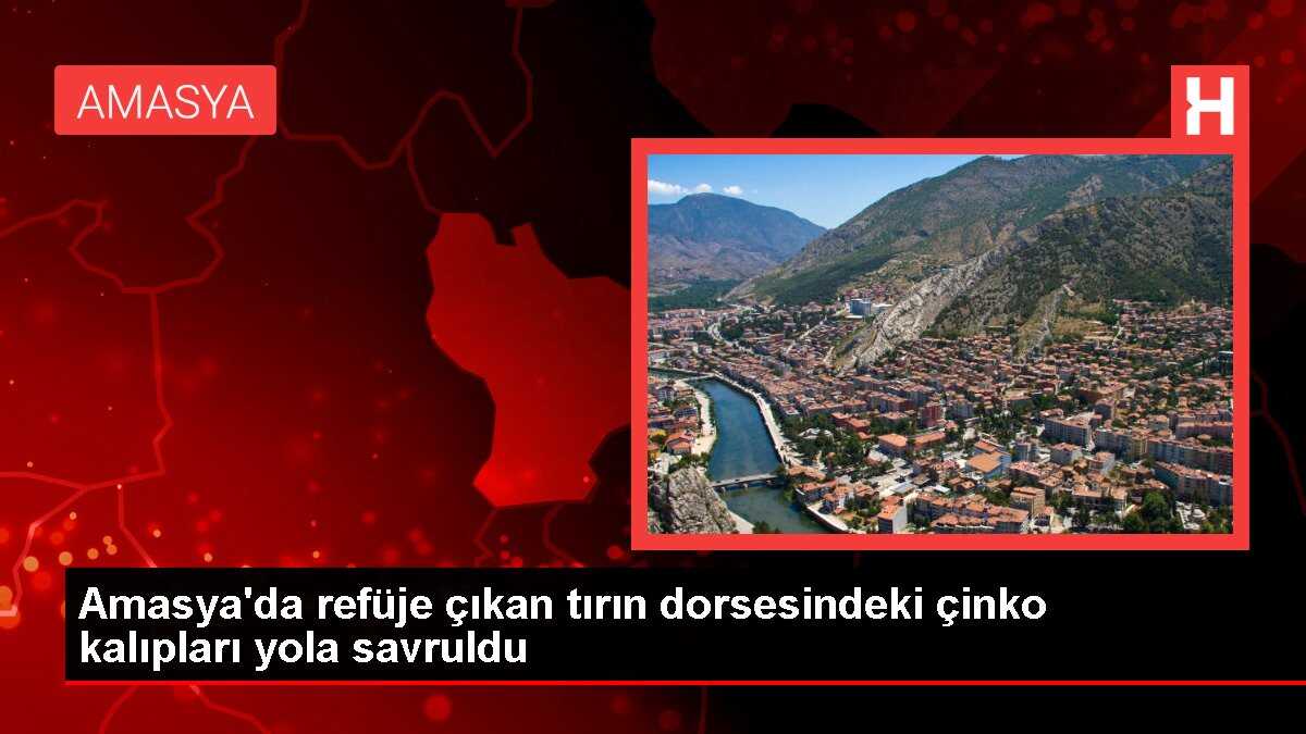 Amasya'da refüje çıkan tırın dorsesindeki çinko kalıpları yola savruldu