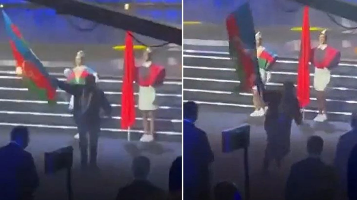 Ermenistan\'da düzenlenen şampiyonada skandal! Görevlinin elindeki Azerbaycan bayrağını alarak ateşe verdi