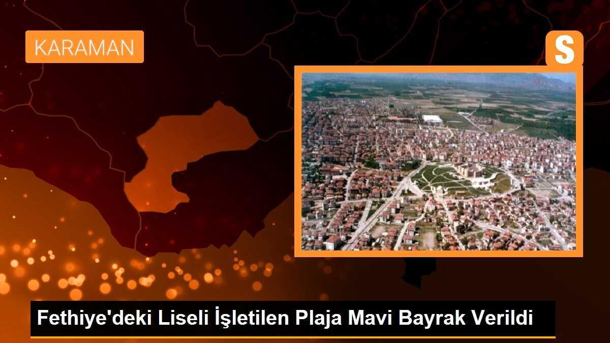 Fethiye\'deki Liseli İşletmecilerin Plajına Mavi Bayrak Verildi
