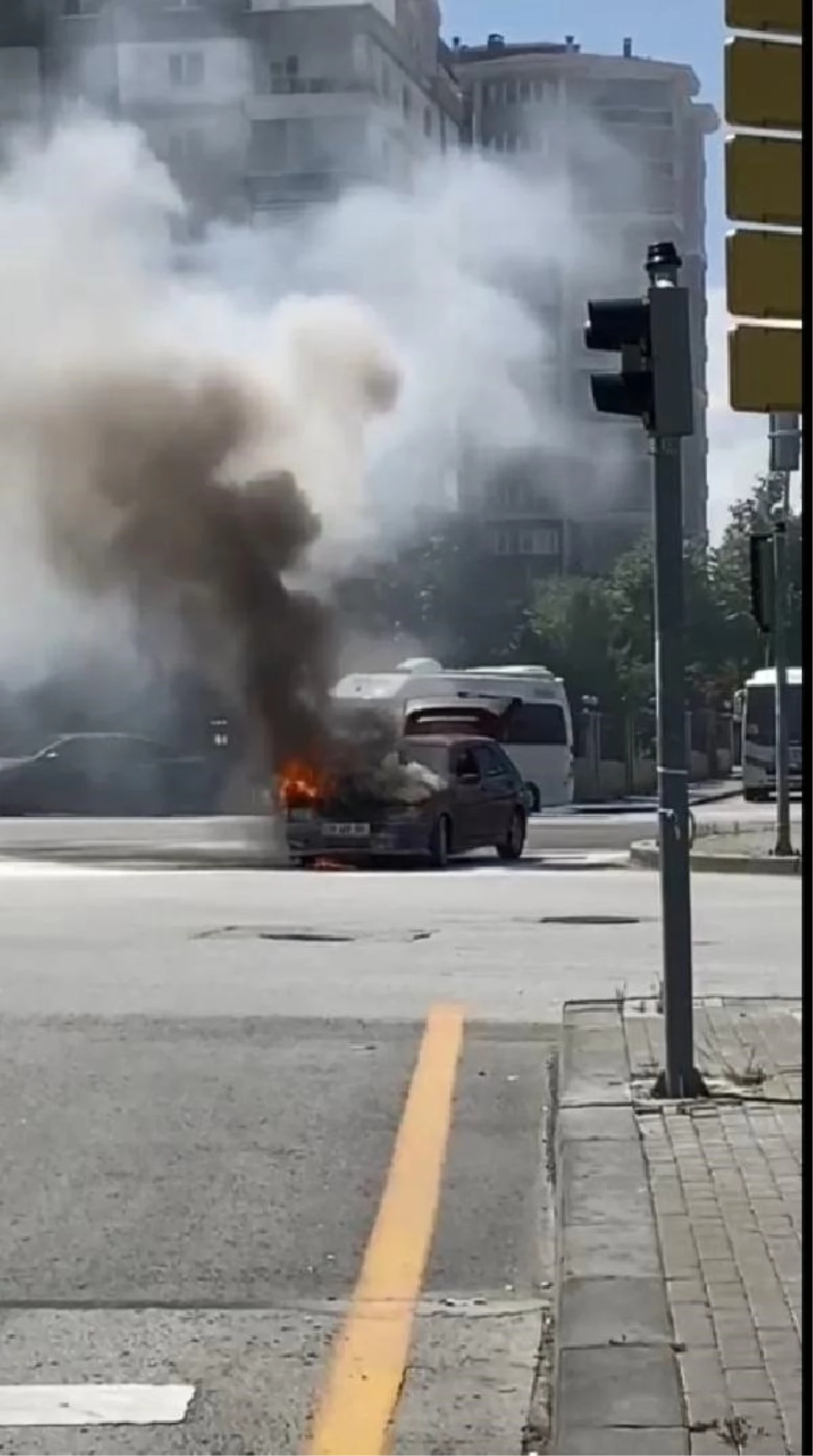 An automobile caught fire while waiting at a red light in Ankara
