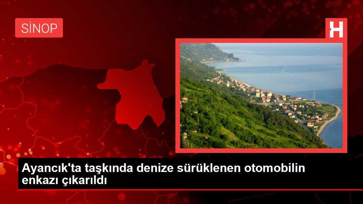 Ayancık'ta taşkında denize sürüklenen otomobilin enkazı çıkarıldı