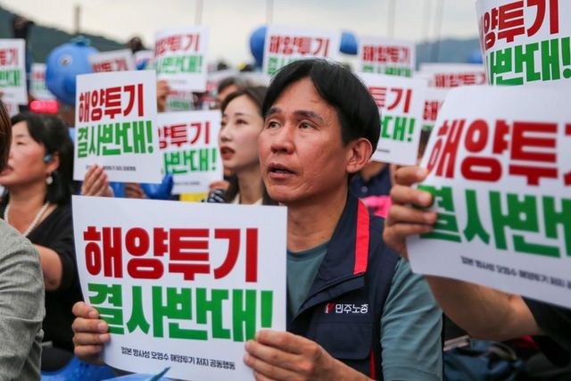 Güney Koreliler, Japonya'nın Nükleer Atık Su Planına İlişkin Uaea Raporunu Protesto Etti