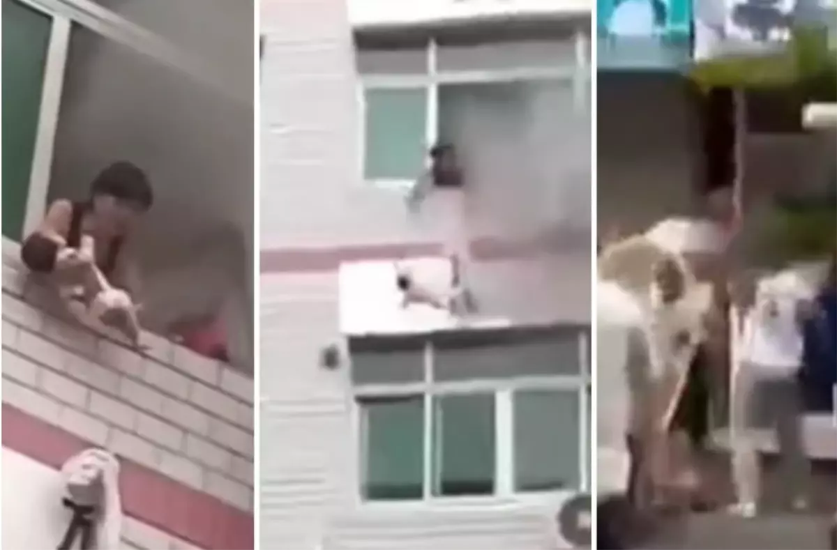 Çin\'de Yangında Anne Bebeğini Atmak Zorunda Kaldı