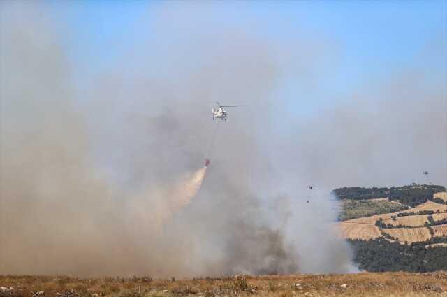 Çanakkale'de rüzgarın etkisiyle yayılan orman yangını kontrol altına alınmaya çalışılıyor