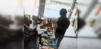 Markete giren hırsız işletme sahibinin cep telefonunu böyle çaldı