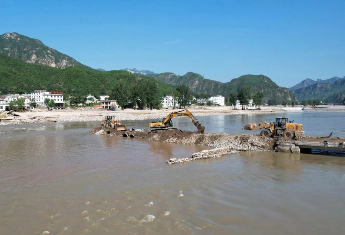 Çin, Doksuri Tayfunu\'nun Etkilediği Bölgelerdeki Hasarlı Su Koruma Tesislerini Onarmak İçin 1,5 Milyar Yuan Tahsis Etti