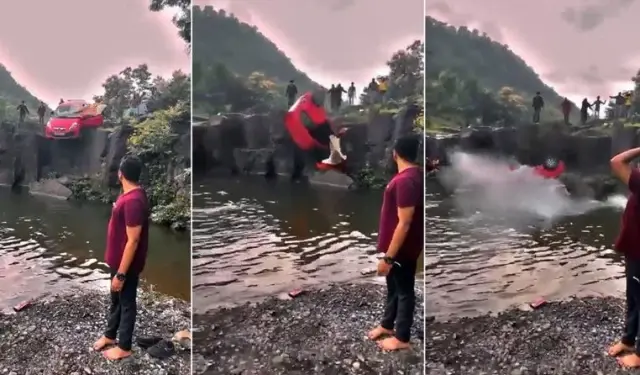 Hindistan'da şelaleye düşen arabada bulunan baba-kız çevredekiler tarafından kurtarıldı