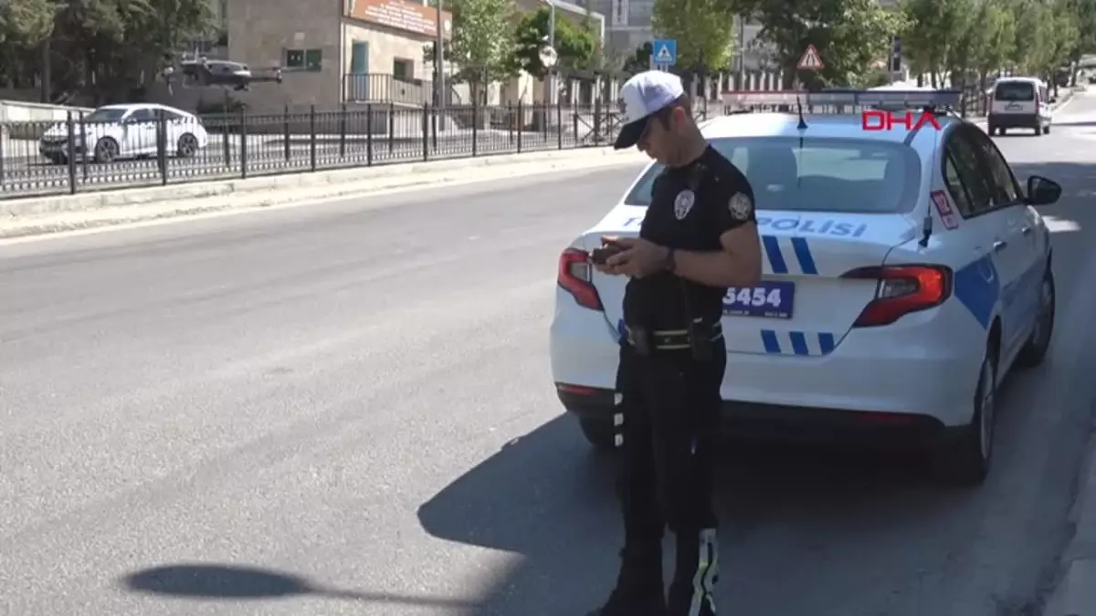 Dron ile kırmızı ışıkta geçen motosiklete ceza