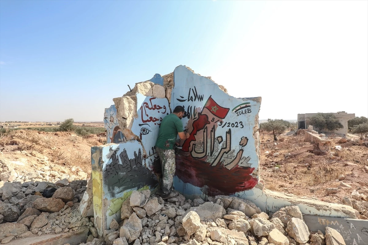 Suriyeli Grafiti Sanatçısı Fas Depremi İçin İdlib\'de Duvar Resmi Yaptı