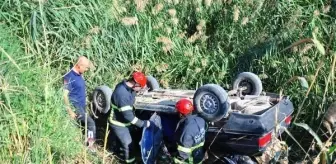 Manisa'da otomobil takla atarak sulama kanalına uçtu: Baba ve kız yaralandı