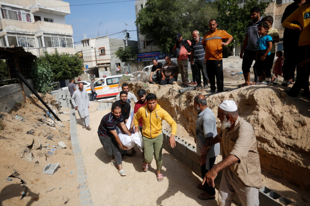 İsrail'in Gazze'ye yönelik saldırılarında hayatını kaybeden Filistinlilerin sayısı 10 bin 569'a yükseldi