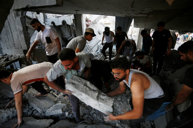 İsrail'in Gazze'ye yönelik saldırılarında hayatını kaybeden Filistinlilerin sayısı 10 bin 569'a yükseldi