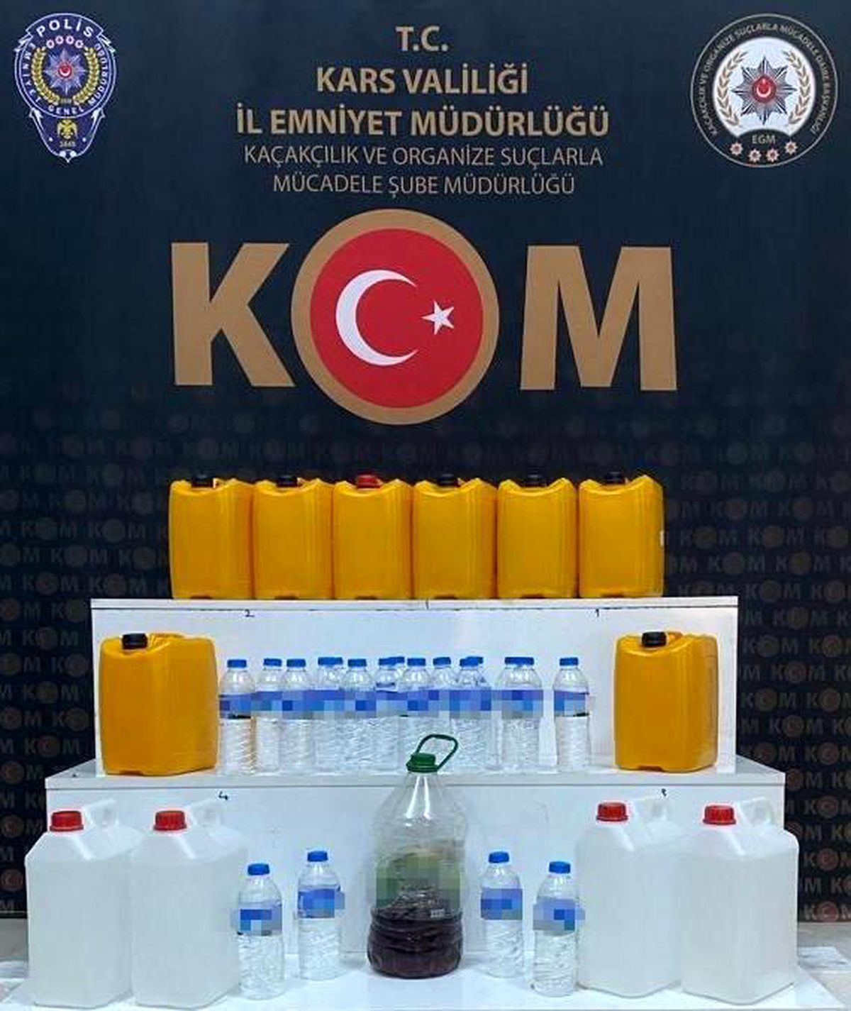 Kars\'ta Sahte Alkollü İçki Operasyonu: 8 Litre Sahte İçki ve 70 Litre Etil Alkol Ele Geçirildi