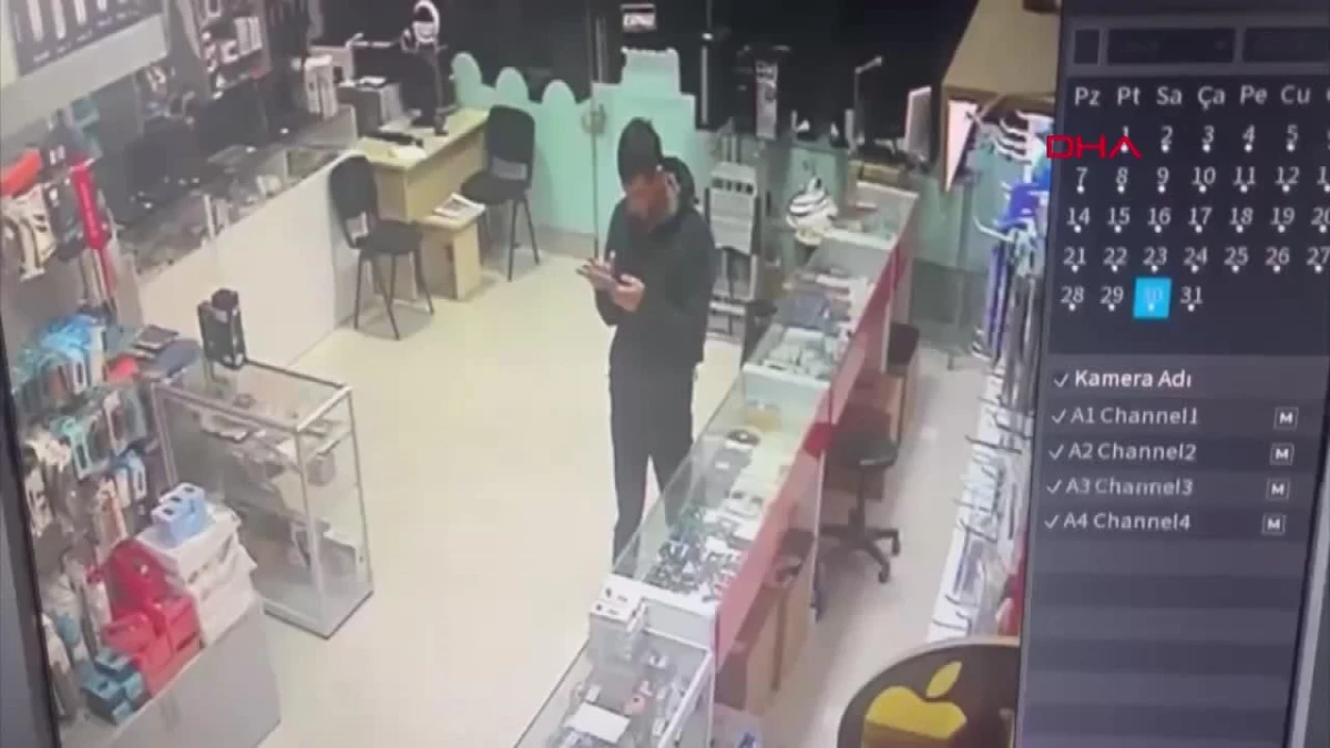 Alanya\'da dükkandan cep telefonu çalan hırsız güvenlik kamerasına yakalandı