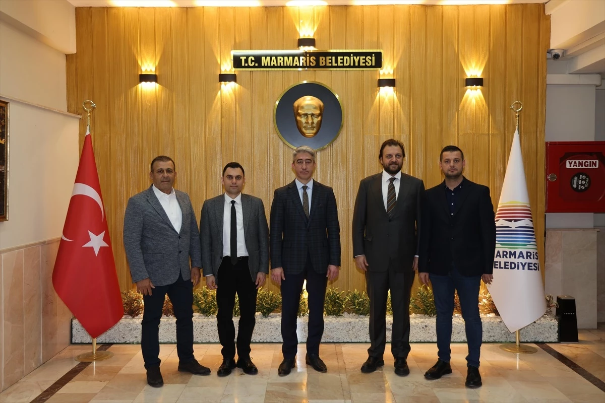 Cumhur İttifakı\'nın Marmaris Belediye Başkan adayı Serkan Yazıcı, Belediye Başkanı Mehmet Oktay\'ı ziyaret etti