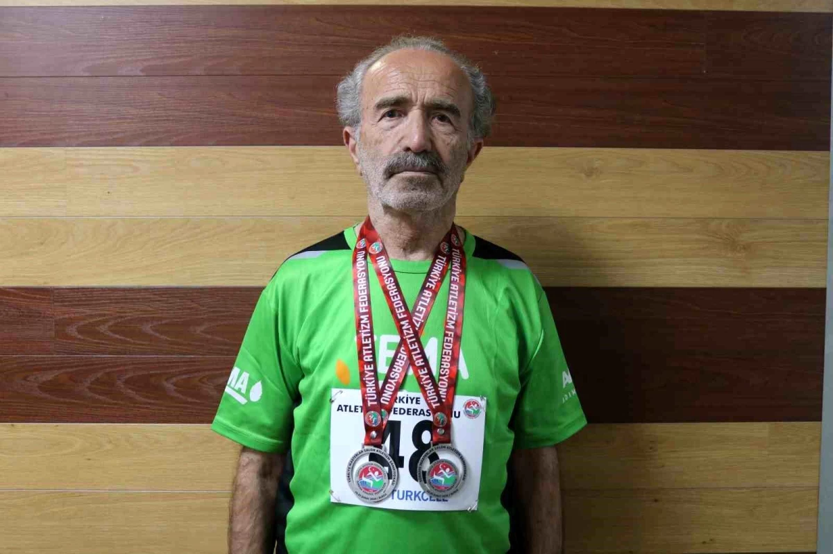 78 yaşındaki atlet Ali Turan, atletizm şampiyonasında 2 gümüş madalya kazandı