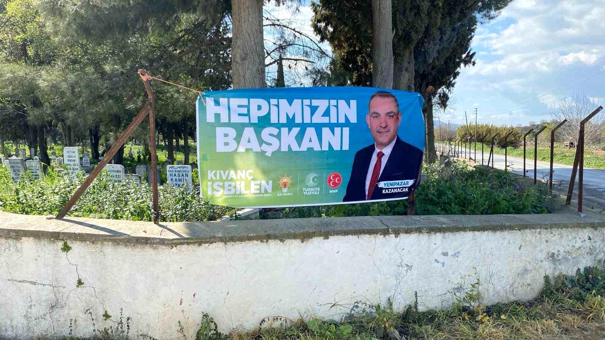 Aydın\'da AK Parti Adayının Mezarlıkta Pankart Asması Tartışma Yarattı