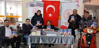 Türkiye Sakatlar Derneği Erzurum Şube Başkanı Sadullah Efe, 'Kadere Yolculuk' adlı kitabı için imza günü düzenledi