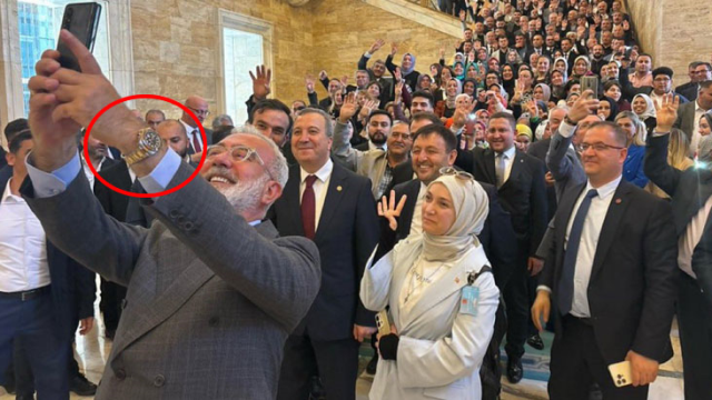 AK Partili Yenişehirlioğlu 'Helal yoldan edindim, takmaya devam edeceğim' dediği saatini eliyle kapattı