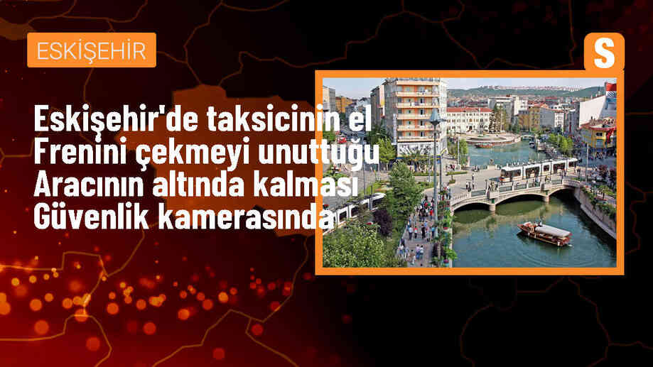 Eskişehir\'de taksicinin el frenini çekmeyi unuttuğu aracının altında kalma anı