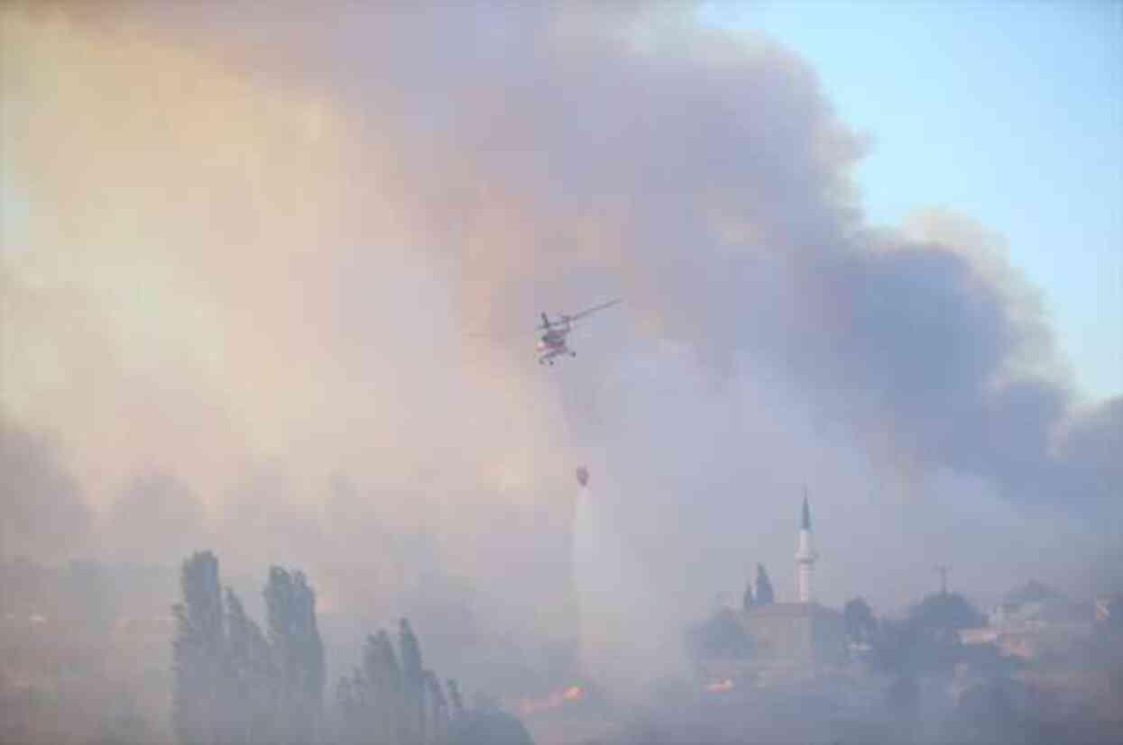 Çanakkale'de çöplükte çıkan yangın ormana sıçradı, 1 mahalle tahliye edildi