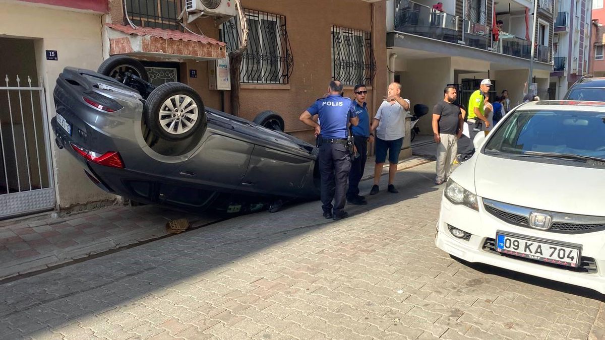 Aydın\'da park halindeki araca çarpan otomobil ters döndü, sürücü yaralandı