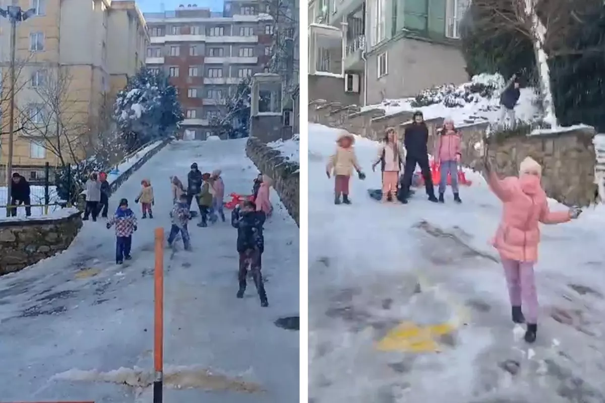 Çocuklar kar küreme aracını kar topu ile püskürttü