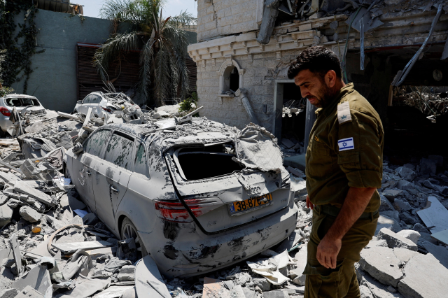 İran, Tel Aviv'i böyle vurdu! Füzelerdeki resim detayı dikkat çekti